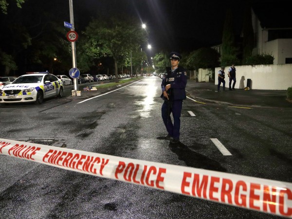 A policeman patrols at a cordon near a mosque in central Christchurch, New Zealand, Friday, March 15, 2019. Multiple people were killed in mass shootings at two mosques full of worshippers attending Friday prayers on what the prime minister called "one of New Zealand's darkest days," as authorities detained four people and defused explosive devices in what appeared to be a carefully planned attack. (AP Photo/Mark Baker)