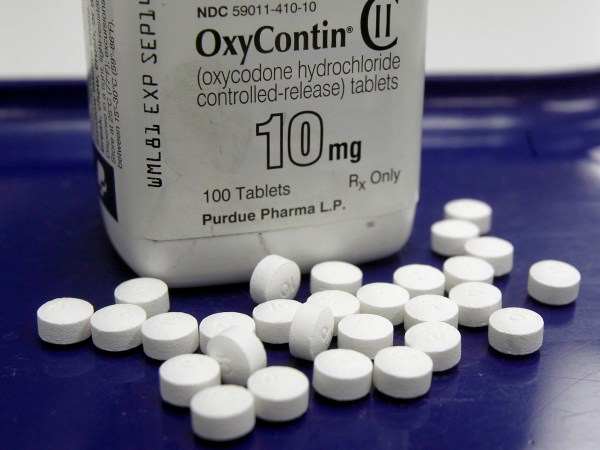 FILE - This Feb. 19, 2013, file photo shows OxyContin pills arranged for a photo at a pharmacy in Montpelier, Vt. Oklahoma's attorney general will announce a settlement Tuesday, March 26, 2019, with Purdue Pharma, one of 13 drug manufacturers named in a state lawsuit that accuses them of fueling the opioid epidemic, but the other companies still face what's expected to be the first of numerous state lawsuits to go to trial. (AP Photo/Toby Talbot, File)