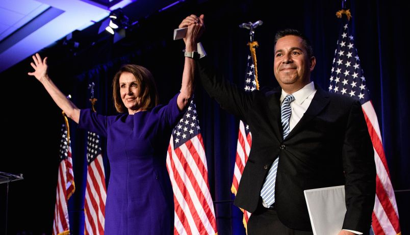 TOPSHOT - House Minority Leader Nancy Pelosi (D-CA) and Representative Ben Ray Lujan (D-MN), DCCC Chairman, celebrate a projected Democratic Party takeover of the House of Representatives during a midterm election night party hosted by the Democratic Congressional Campaign Committee on November 7, 2018 in Washington, DC. (Photo by Brendan Smialowski / AFP) / ALTERNATIVE CROP        (Photo credit should read BRENDAN SMIALOWSKI/AFP/Getty Images)
