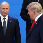 BUENOS AIRES, ARGENTINA - NOVEMBER,30 (RUSSIA OUT) U.S. President Donald Trump (R) looks on Russian President Vladimir Putin (L) during the family photo at the G20 Summit's Plenary Meeting in Buenos Aires, Argentina, November,30,2018. U.S.Preisident Donald Trump has cancelled his meeting with Vladimir Putin at the G20 Summit in Argentina planned on Saturday. (Photo by Mikhail Svetlov/Getty Image