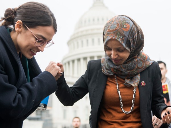 UNITED STATES - FEBRUARY 07: Reps. Alexandria Ocasio-Cortez, D-N.Y., left, and Ilhan Omar, D-Minn., attend a rally on the East Front of the Capitol to call on Congress to defund Immigration and Customs Enforcement (ICE) and U.S. Customs and Border Protection (CBP) on Thursday, February 7, 2019. (Photo By Tom Williams/CQ Roll Call)