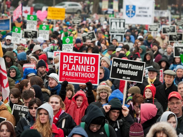 UNITED STATES - JANUARY 23:  The crowd listens to Speaker John Boehner, R-Ohio, address the March for Life rally on the Mall.  Thousands of pro-life supporters gathered to hear addresses by Congressional leaders and then march to the Supreme Court to express disagreement with the Roe v. Wade decision which was made on January 22, 1973.  (Photo By Tom Williams/CQ Roll Call)