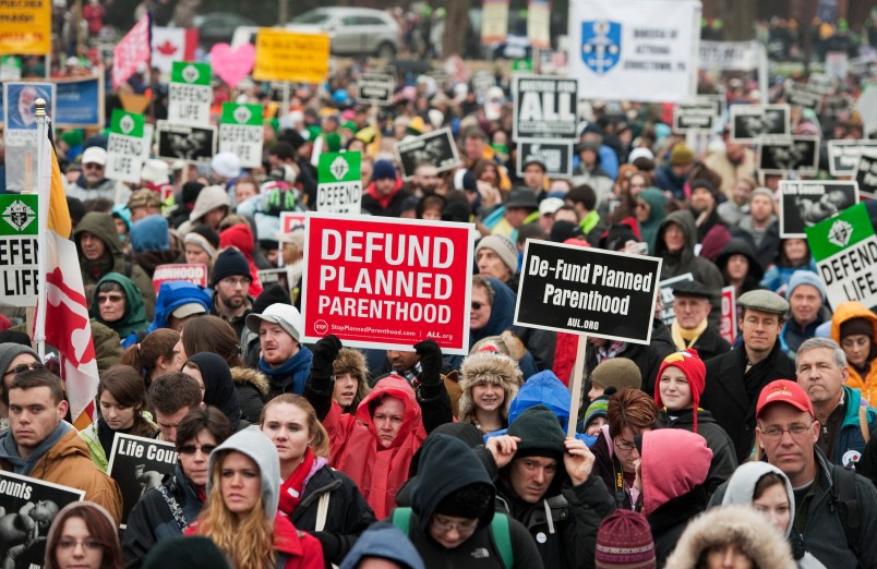 UNITED STATES - JANUARY 23:  The crowd listens to Speaker John Boehner, R-Ohio, address the March for Life rally on the Mall.  Thousands of pro-life supporters gathered to hear addresses by Congressional leaders and then march to the Supreme Court to express disagreement with the Roe v. Wade decision which was made on January 22, 1973.  (Photo By Tom Williams/CQ Roll Call)