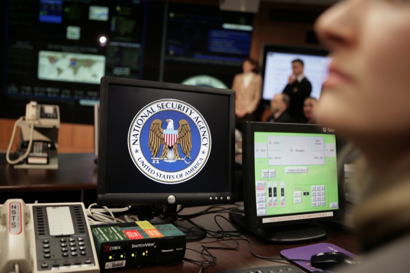 U.S. President George W. Bush gestures visits  the National Security Agency in Fort Meade, Maryland January 25, 2006. Bush met workers and made remarks on American national security at the high-security installation, which he last visited in 2002. Photo by Brooks Kraft/Corbis