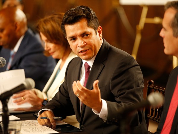 LOS ANGELES, CA â€“ AUGUST 16, 2017: Congressman Jimmy Gomez, center, with House Democratic Leader Nancy Pelosi, left and Mayor Eric Garcetti, right, talk during a conference Wednesday, August 16, 2017 at Los Angeles Union Station about the â€œBetter Dealâ€ economic agenda unveiled by House and Senate Democrats last month. (Al Seib / Los Angeles Times)