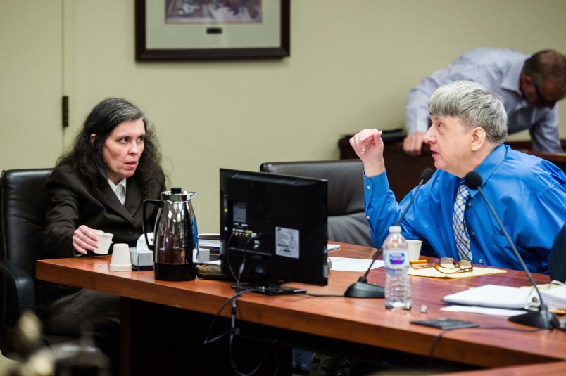 FILE - This {{iptcmonthnameap} 20, 2018, file photo shows Louise Turpin, left, and her husband, David Turpin, right, appear for a preliminary hearing in Superior Court in Riverside, Calif. A California couple who starved a dozen of their children and shackled some to beds face sentencing for years of abuse. David and Louise Turpin are due Friday in Riverside County Superior Court for a proceeding that is largely a formality. The couple pleaded guilty in February to torture and other abuse and agreed to serve at least 25 years in prison.. (Watchara Phomicinda/The Press-Enterprise via AP, File)