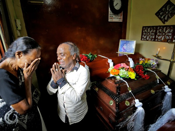 A Sri Lankan man weeps over the deaths of his three children who died in an explosion at the St. Anthony's church on Easter Sunday in Colombo, Sri Lanka, Tuesday, April 23, 2019. (AP Photo/Eranga Jayawardena)
