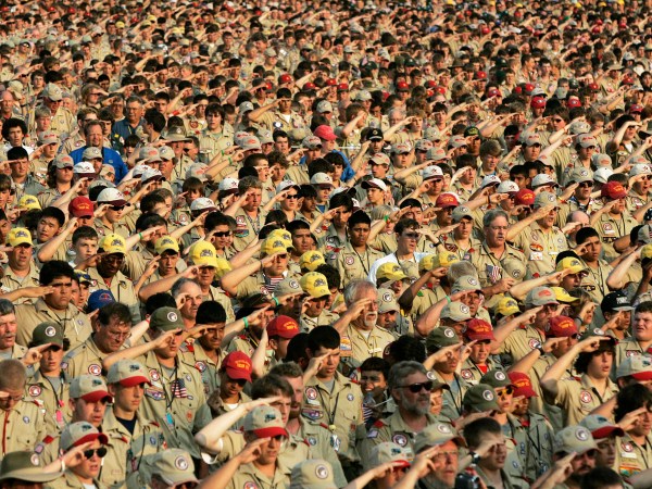 Thousands of Boy Scouts render the Scout salute as they recite the Pledge of Allegiance during the  Boy Scout Jamboree, Sunday, July 31, 2005 at Fort AP Hill in Bowling Green, Va. (AP Photo/ Haraz N. Ghanbari)