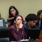 (L-R) Rep. Alexandria Ocasio-Cortez (D-NY), Rep. Ayanna Pressley (D-MA), and Rep. Rashida Tlaib (D-MI), listen as Michael Cohen, former lawyer for U.S. President Donald Trump, testifies before the House Oversight Committee on Capitol Hill, on Wednesday, February 27, 2019. (Photo by Cheriss May/NurPhoto)