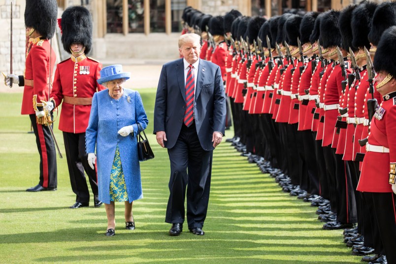 The Queen walks with President Trump as they inspect the Coldstream guards at Windsor castle.