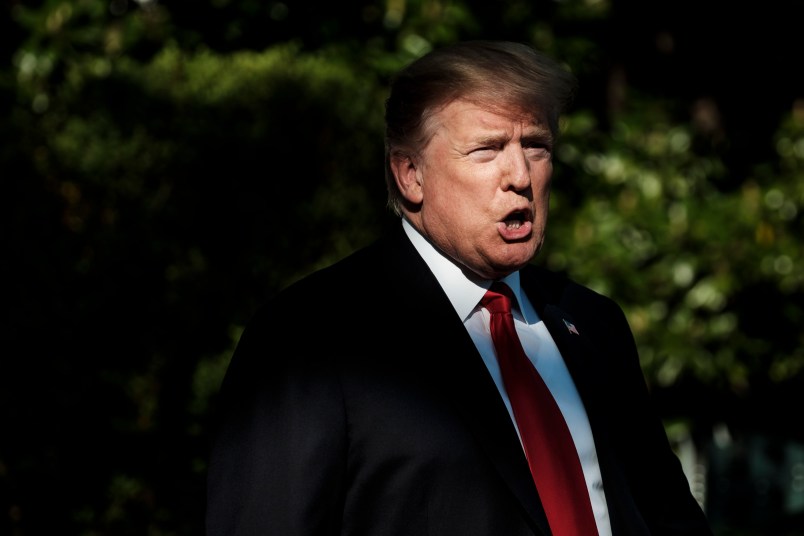 WASHINGTON, DC - APRIL 27: President Donald Trump stops to talk to the media about the shooting in a California Mosque as he makes his way to Marine One on the South Lawn of the White House as he travels to Green Bay Wisconsin for a campaign rally on April 27, 2019 in Washington, DC. The President was traveling on the night of the annual White House Correspondents’ Association dinner in Washington. (Photo by Pete Marovich/Getty Images)