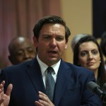 Florida Gov. Ron DeSantis speaks during the bill signing ceremony on Education Achievements at William J. Kirlew Junior Academy in Miami Gardens, Fla., on Thursday, May 9, 2019. (David Santiago/Miami Herald/TNS)