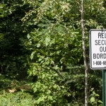 Grand Marais, Minnesota. Secure our border sign on a trail that leads to Canada through the Superior National Forest.