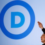 Democratic National Committee Chairman Tim Kaine reveals his party's new logo during an event in the Jack Morton Auditorium on the campus of George Washington University September 15, 2010 in Washington, DC. Kaine revealed the logo after an event to drum up excitement ahead of the November midterm elections.