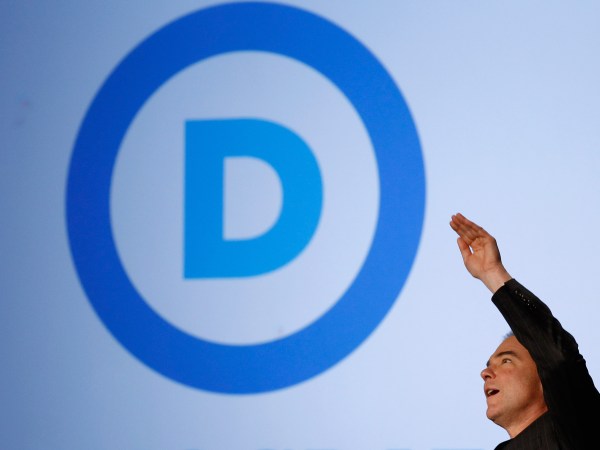 Democratic National Committee Chairman Tim Kaine reveals his party's new logo during an event in the Jack Morton Auditorium on the campus of George Washington University September 15, 2010 in Washington, DC. Kaine revealed the logo after an event to drum up excitement ahead of the November midterm elections.