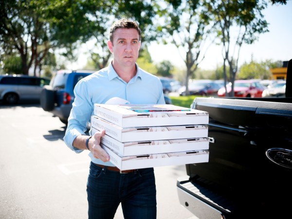 SANTEE, CA - NOVEMBER 06: Duncan Hunter(R-CA) brings Pizza to campaign staffers during a visit to one of his headquarters in Santee, CA on November 6, 2018 in Santee, California. (Photo by Sandy Huffaker/Getty Images)