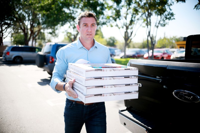 SANTEE, CA - NOVEMBER 06: Duncan Hunter(R-CA) brings Pizza to campaign staffers during a visit to one of his headquarters in Santee, CA on November 6, 2018 in Santee, California. (Photo by Sandy Huffaker/Getty Images)