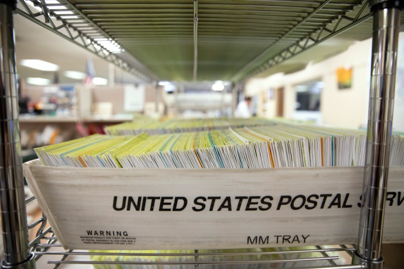 MODESTO, CA - NOVEMBER 06: Mailed in ballots sit in US Postal Service bins inside the office of the Stanislaus County Clerk on November 6, 2018 in Modesto, California. Stanislaus County is in California's 10th Congressional District which is host to a close race for US Congress between Democrat Josh Harder and Republican Jeff Denham. (Photo by Alex Edelman/Getty Images)