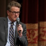 MSNBC 'Morning Joe' hosts Joe Scarborough and Mika Brzezinski are interviewed by philanthropist and financier David Rubenstein during a Harvard Kennedy School Institute of Politics event in the McGowan Theater at the National Archives July 12, 2017 in Washington, DC. Scarborough and Brzezinski, who are engaged to be married, were recently attacked by President Donald Trump on Twitter, where he called the hosts 'Psycho Joe' and 'low I.Q. Crazy Mika,' among other personal insults.