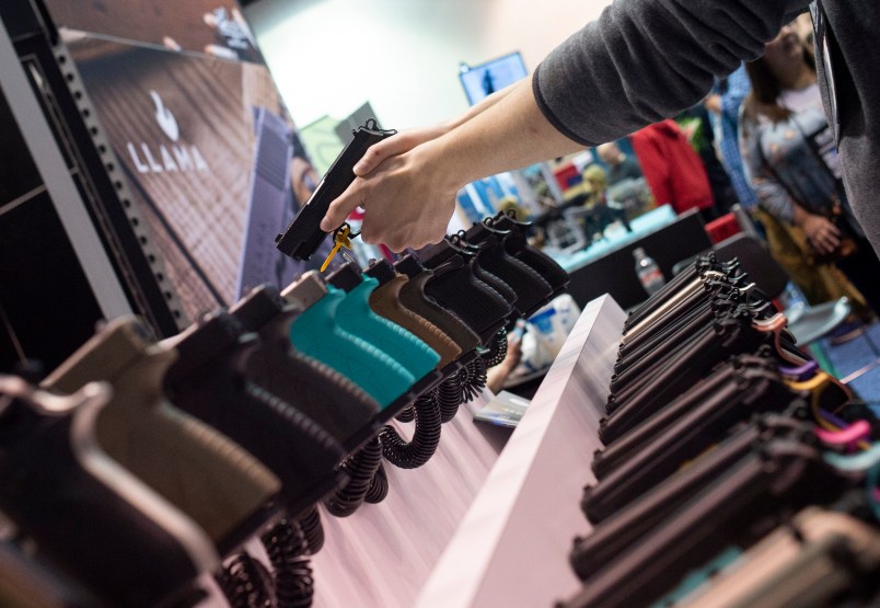 INDIANAPOLIS STATE HOUSE, INDIANAPOLIS, INDIANA, UNITED STATES - 2019/04/27: NRA members are seen checking out weapons and accessories during an exhibition.NRA members and leaders gather in Indianapolis, Indiana for the annual NRA Meeting where President Donald Trump and others spoke and attendees were able to view a multitude of exhibits featuring firearms, outdoors equipment, and shooting gear. (Photo by Matthew Hatcher/SOPA Images/LightRocket via Getty Images)