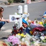 EL PASO, TX - AUGUST 15:  People gather at a makeshift memorial honoring victims outside Walmart, near the scene of a mass shooting which left at least 22 people dead, on August 15, 2019 in El Paso, Texas. A 21-year-old white male suspect remains in custody in El Paso which sits along the U.S.-Mexico border. (Photo by Sandy Huffaker/Getty Images)