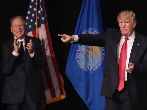 ATLANTA, GA - APRIL 28:  President Donald Trump is applauded by Wayne LaPierre (L),  executive vice president and CEO of the NRA, during the NRA-ILA's Leadership Forum at the 146th NRA Annual Meetings & Exhibits on April 28, 2017 in Atlanta, Georgia. The convention is the largest annual gathering for the NRA's more than 5 million members. Trump is the first president to address the annual meetings since Ronald Reagan.  (Photo by Scott Olson/Getty Images)