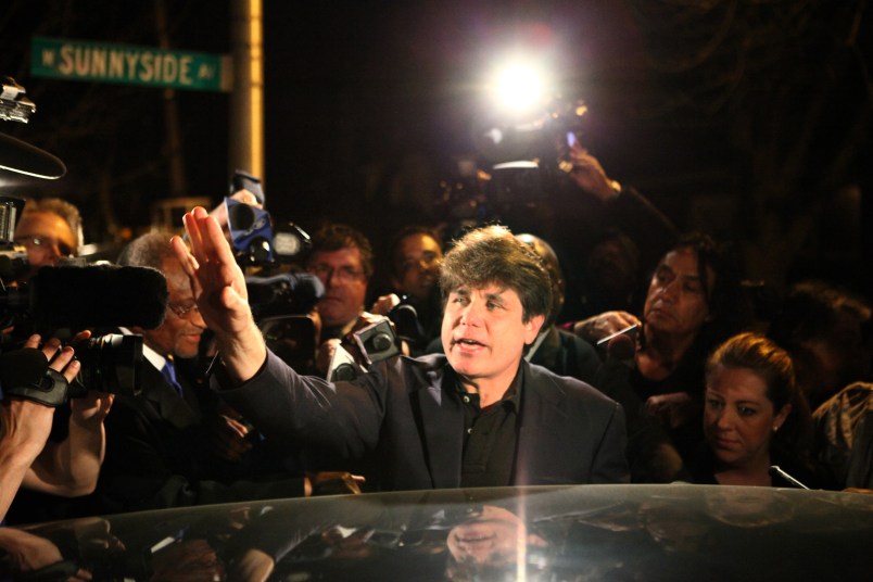 Former Illinois Gov. Rod Blagojevich waves to the crowd in front of his home as he leaves for prison on March 15, 2012, in Chicago. On Tuesday, April 18, 2017, Blagojevich's lawyers repeated assertions that federal prosecutors are clearly wrong when it comes to the ex-governor's alleged crimes. (William DeShazer/Chicago Tribune/TNS)