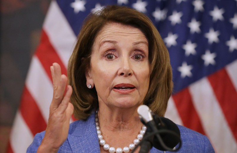 House Minority Leader Nancy Pelosi (D-CA) and fellow Democratic members of the House hold a news conference to call on Republicans to fund programs to combat the spread of the Zika virus at the U.S. Capitol September 7, 2016 in Washington, DC. Congress returned yesterday from a seven-week break during which time the Florida Department of Health confirmed the first local cases of Zika on July 29.