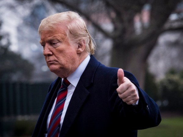 WASHINGTON, DC - JANUARY 19: President Trump walks toward the White House after landing aboard Marine One on the South Lawn of the White House on January 19, 2019 in Washington, DC. Trump was returning from Dover Air Force Base in Delaware where he visited with families four Americans who were killed in an explosion Wednesday in Syria. (Photo by Pete Marovich/Getty Images)