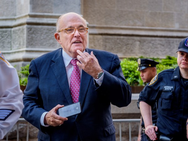 MANHATTAN, NEW YORK, NY, UNITED STATES - 2018/05/23: Donald Trump's lawyer Rudy Giuliani caught allegedly giving the finger to a crowd booing him - Hundreds of New Yorkers joined members of Rise and Resist to protest Donald Trump's visit to New York City  outside the Lotte New York Palace Hotel, where he's expected to participate in a roundtable on immigration and then attend dinner with supporters. (Photo by Erik McGregor/LightRocket via Getty Images)