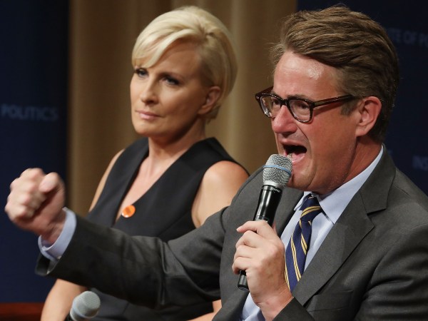 MSNBC 'Morning Joe' hosts Joe Scarborough and Mika Brzezinski are interviewed by philanthropist and financier David Rubenstein during a Harvard Kennedy School Institute of Politics event in the McGowan Theater at the National Archives July 12, 2017 in Washington, DC. Scarborough and Brzezinski, who are engaged to be married, were recently attacked by President Donald Trump on Twitter, where he called the hosts 'Psycho Joe' and 'low I.Q. Crazy Mika,' among other personal insults.