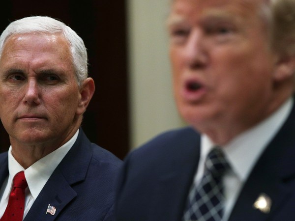 WASHINGTON, DC - JULY 18:  U.S. President Donald Trump (R) speaks to members of the media as Vice President Mike Pence listens (L) during a lunch with service members at the Roosevelt Room of the White House July 18, 2017 in Washington, DC. President Trump took questions from the press and discussed on health care.  (Photo by Alex Wong/Getty Images)