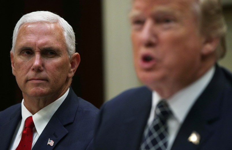 WASHINGTON, DC - JULY 18:  U.S. President Donald Trump (R) speaks to members of the media as Vice President Mike Pence listens (L) during a lunch with service members at the Roosevelt Room of the White House July 18, 2017 in Washington, DC. President Trump took questions from the press and discussed on health care.  (Photo by Alex Wong/Getty Images)