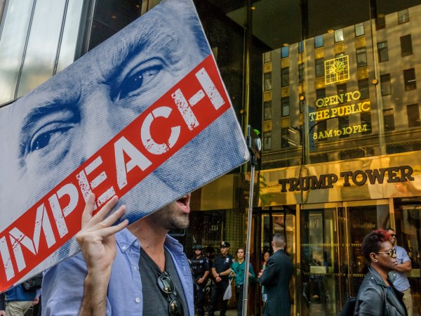 TRUMP TOWER, NEW YORK, UNITED STATES - 2018/06/07: Direct action group Rise and Resist demonstrated in front of Trump Tower, demanding the impeachment of Donald Trump. As he continues to try to discredit Mueller’s investigation, attack the press, and act in his self-interest rather than the interest of American citizens, Rise and Resist will press for impeachment through non-violent protest. (Photo by Erik McGregor/Pacific Press/LightRocket via Getty Images)