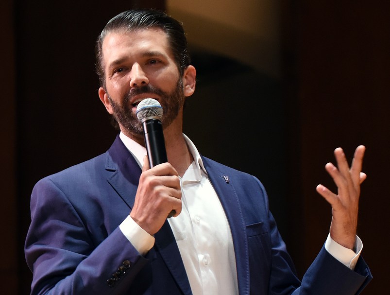 GAINESVILLE, FLORIDA, UNITED STATES - 2019/10/10: Donald Trump, Jr. speaks at the University of Florida.The couple was paid $50,000 from student activity fees and tickets were distributed free of charge to students. The event drew hundreds of protesters outside the University Auditorium who objected to what they called a campaign rally. Trump, Jr and Guilfoyle spoke for less than a half hour each and answered a few questions submitted on Twitter. Several protesters were removed from the auditorium during the event. (Photo by Paul Hennessy/SOPA Images/LightRocket via Getty Images)