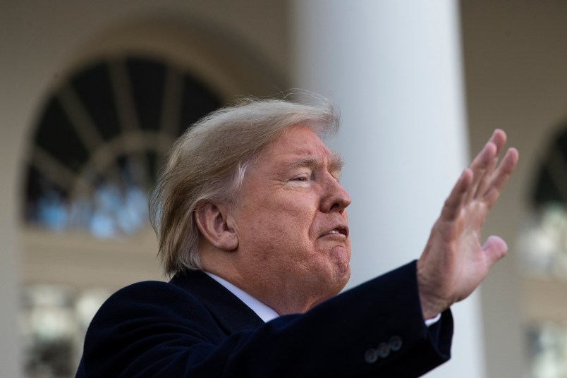 WASHINGTON, DC - NOVEMBER 26: U.S. President Donald Trump waves after giving the National Thanksgiving Turkey Butter a presidential ‘pardon’ during the traditional event in the Rose Garden of the White House November 26, 2019 in Washington, DC. The turkey pardon was made official in 1989 under former President George H.W. Bush, who was continuing an informal tradition started by President Harry Truman in 1947. Following the presidential pardon, the 47-pound turkey which was raised by farmer Wellie Jackson of Clinton, North Carolina, will reside at his new home, 'Gobbler's Rest,' at Virginia Tech. (Photo by Drew Angerer/Getty Images)