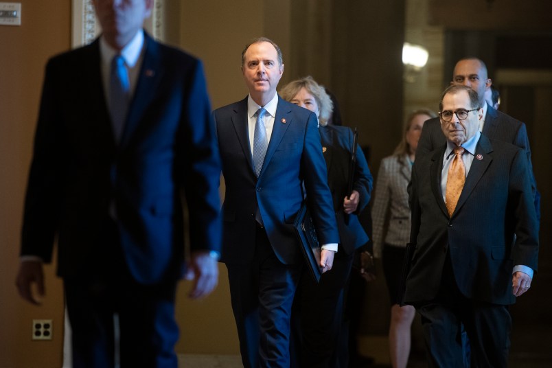 UNITED STATES - JANUARY 16: Impeachment managers House Intelligence Committee Chairman Adam Schiff, D-Calif., center, Judiciary Committee Chairman Jerrold Nadler, D-N.Y., and other mangers are seen arriving to the Senate before Schiff read the articles of impeachment against President Donald Trump on the Senate floor on Thursday, January 16, 2020. (Photo By Tom Williams/CQ Roll Call)