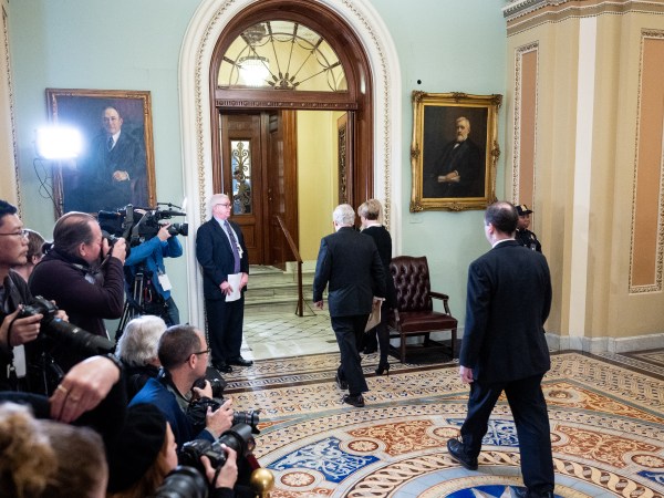WASHINGTON, UNITED STATES - JANUARY 21 2020: U.S. Senator Mitch McConnell (R-KY) walks towards the Senate Chamber for the Senate Impeachment Trial in Washington.