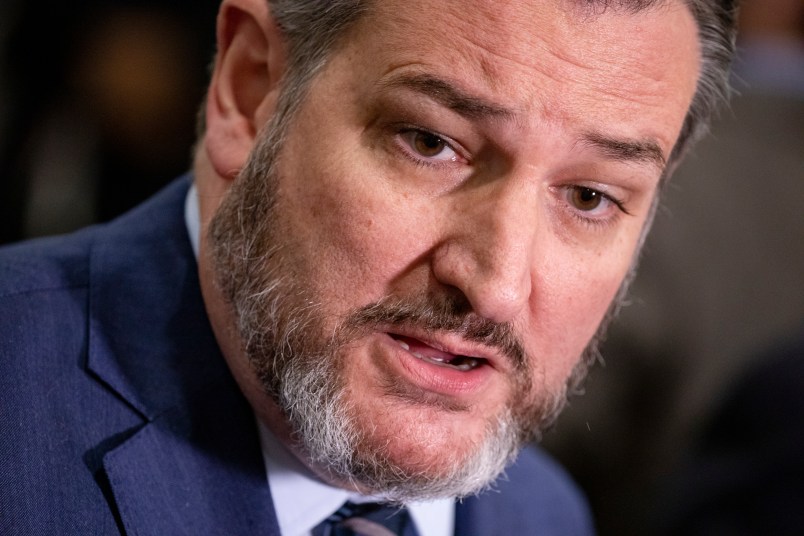 WASHINGTON, DC - JANUARY 29: Sen. Ted Cruz (R-TX) takes questions from reporters in the Senate subway during a recess in the Senate impeachment trial of President Donald Trump in the on January 29, 2020 in Washington, DC. The trial entered the phase today where senators will have the opportunity to submit written questions to the House managers and President Trump's defense team. (Photo by Samuel Corum/Getty Images) *** Local Caption *** Ted Cruz