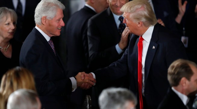WASHINGTON, DC - JANUARY 20:  President Donald Trump greets former President Bill Clinton at the Inaugural Luncheon in the US Capitol January 20, 2017 in Washington, DC. President Trump will attend the luncheon along with other dignitaries. (Photo by Aaron P. Bernstein/Getty Images)