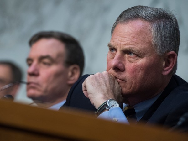 UNITED STATES - MARCH 21: Chairman Richard Burr, R-N.C., right, and ranking member Sen. Mark Warner, D-Va., conduct a Senate Intelligence Committee hearing in Hart Building on Russian Interference in the 2016 election on March 21, 2018. Homeland Security Secretary Kirstjen Nielson, and former Secretary Jeh Johnson, also testified. (Photo By Tom Williams/CQ Roll Call)