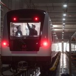 In this March 23, 2020 photo released by Xinhua News Agency, workers prepares a subway train for restoration of public transport in Wuhan, in central China's Hubei province. China's health ministry says Wuhan has now gone several consecutive days without a new infection, showing the effectiveness of draconian travel restrictions that are slowly being relaxed around the country.  (Xiao Yijiu/Xinhua via AP)