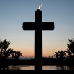 LYNCHBURG, VA - JULY 19: A cross sits at the Jerry Falwell Memorial at Liberty University on July 19, 2019 in Lynchburg, Virginia. Falwell founded Liberty University in 1971. (Photo by Marlena Sloss/The Washington Post)