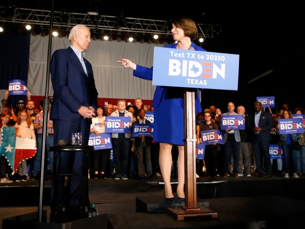 DALLAS, TX - MARCH 02: Democratic presidential candidate former Vice President Joe Biden is joined on stage by Sen. Amy Klobuchar (D-MN) during a campaign event on March 2, 2020 in Dallas, Texas. Klobuchar has suspended her campaign and endorsed Biden before the upcoming Super Tuesday Democratic presidential primaries. (Photo by Ron Jenkins/Getty Images)