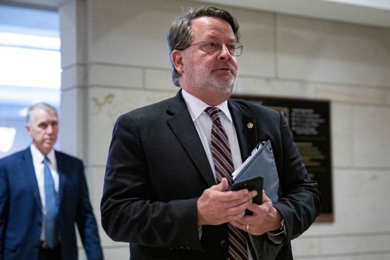 WASHINGTON, DC - MARCH 10: Sen. Gary Peters (D-MI) leaves a briefing for Senators by officials from the Department of Homeland Security, Federal Bureau of Investigations, Director of National Intelligence, and the National Security Agency on the state of election security on Capitol Hill on March 10, 2020 in Washington, DC. (Photo by Samuel Corum/Getty Images) *** Local Caption *** Gary Peters