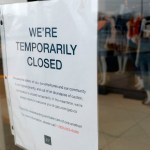 A  GAP store with a Closed sign due to the COVID-19 outbreak in Farmington Hills, Michigan, on March 26, 2020. - The economic shutdown caused by the coronavirus pandemic sparked an explosion of Americans filing for unemployment benefits, surging to 3.3 million last week -- the highest number ever recorded, the Labor Department reported Thursday. (Photo by JEFF KOWALSKY / AFP) (Photo by JEFF KOWALSKY/AFP via Getty Images)