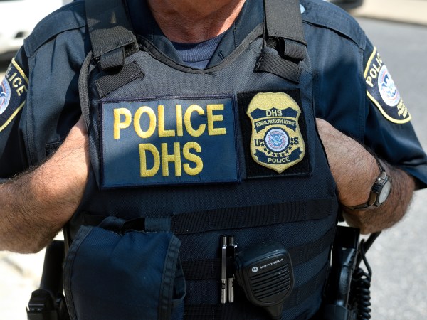 Law enforcement officers of the Philadelphia Police Department, Homeland Security and National Park Service stands by as protestors build a small encampment outside a Department of Homeland Security U.S. Immigrations and Custom Enforcement (ICE) office in Center City Philadelphia, PA, on July 3, 2018. (Photo by Bastiaan Slabbers/NurPhoto)