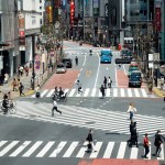 Fewer than usual people at Shibuya Scramble Crossing is seen Wednesday, April 8, 2020, in Tokyo. Japanese Prime Minister Shinzo Abe declared a state of emergency yesterday for Tokyo and six other prefectures to ramp up defenses against the spread of the coronavirus. (AP Photo/Eugene Hoshiko)