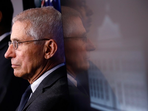 Director of the National Institute of Allergy and Infectious Diseases Dr. Anthony Fauci listens as President Donald Trump speaks during a coronavirus task force briefing at the White House, Saturday, March 21, 2020, in Washington. (AP Photo/Patrick Semansky)