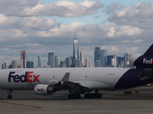 NEWARK, NJ - OCTOBER 13: A FedEx airplane makes its way to a runway in front of the skykine of New York City at Newark Liberty Airport on October 13, 2018 in Newark, New Jersey. (Photo by Gary Hershorn/Getty Images)